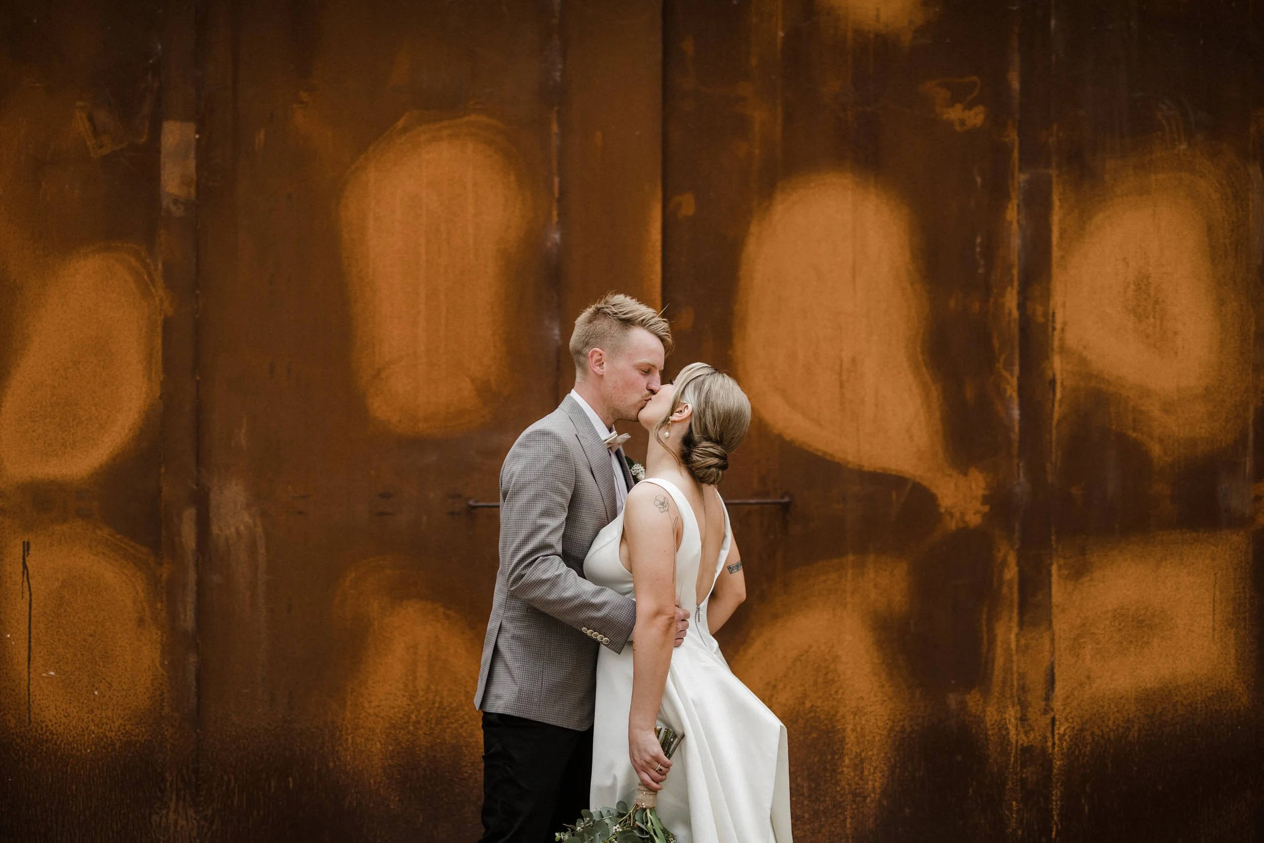 Intimate Forest Wedding - Sinclairs Gully Winery 56 - couple portraits sinclairs rust wall.jpg