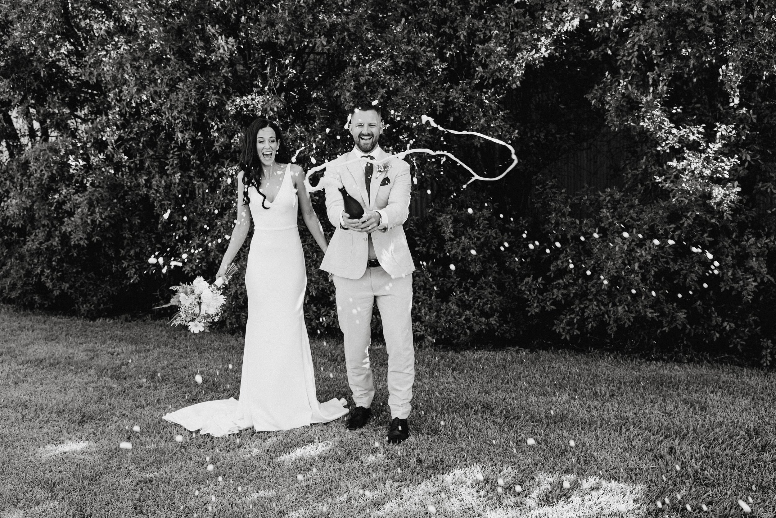 36 Lake Breeze Elopement champagne pop.jpg