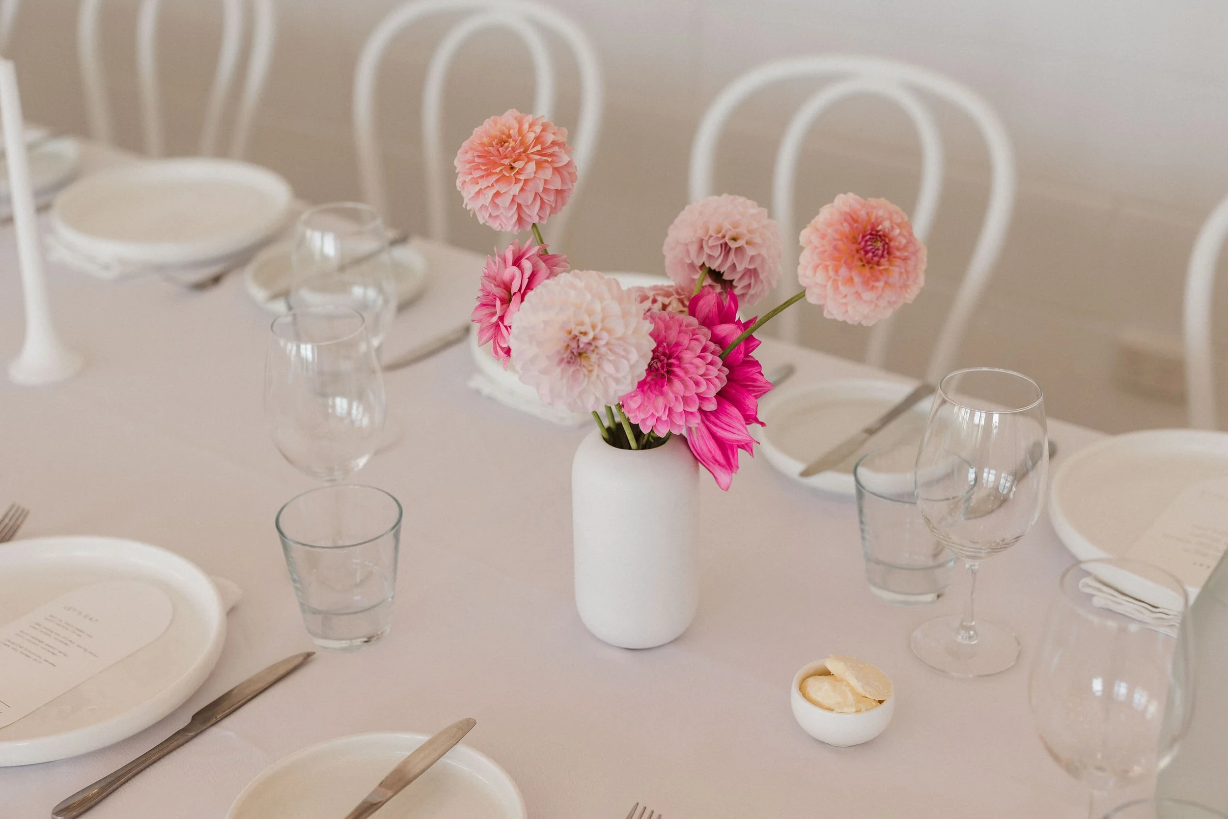35 Simon Hacket Winery Wedding Reception brifht florals.jpg