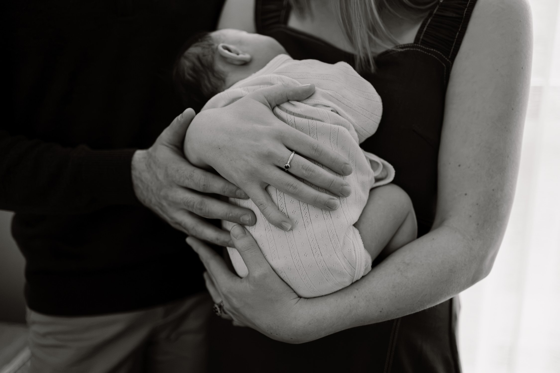04 Natural Newborn Portraits at Home Clare Valley black and white close up intimate cuddle.jpg