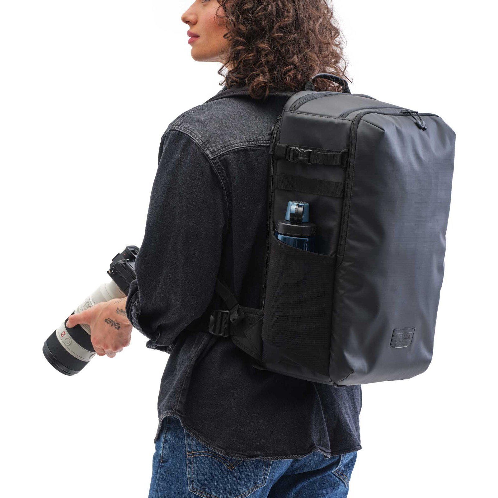 Tenba Solstice 24L - Model wearing pack.jpg