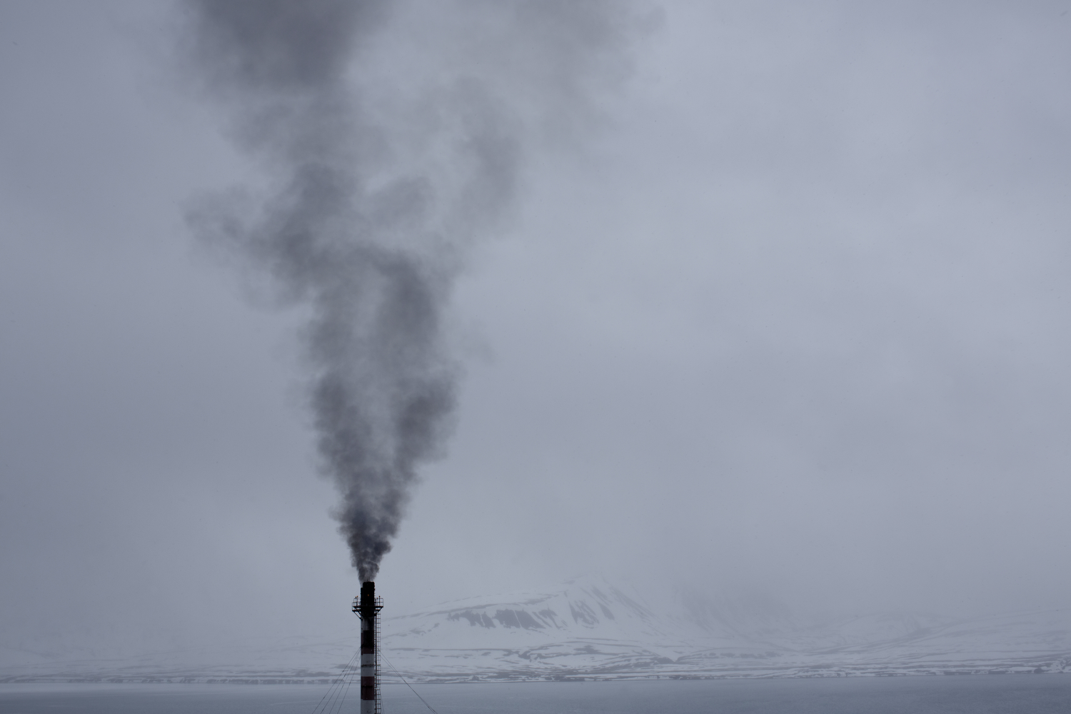     Much of Barentsburg is covered with slag from coal production, and the snow is colored dark gray when the wind takes hold of coal dust.       