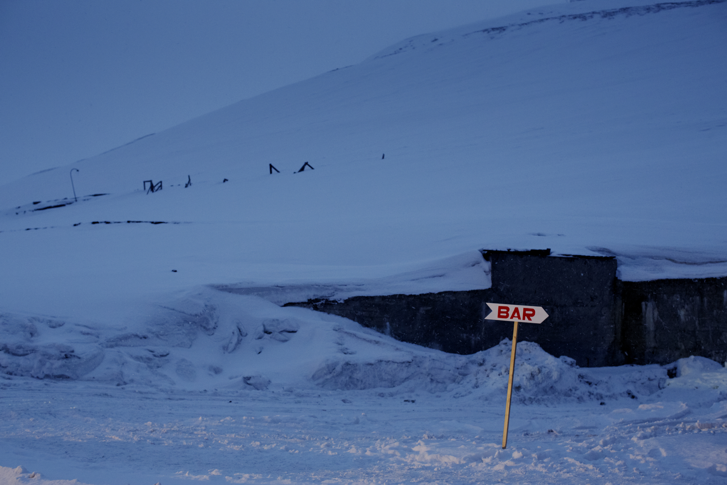    The expensive bar at the hotel in Barentsburg is mainly used by the tourists.   