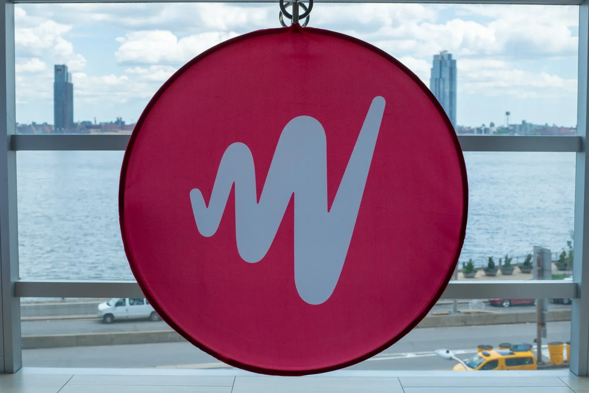 Hanging swing with branded fabric