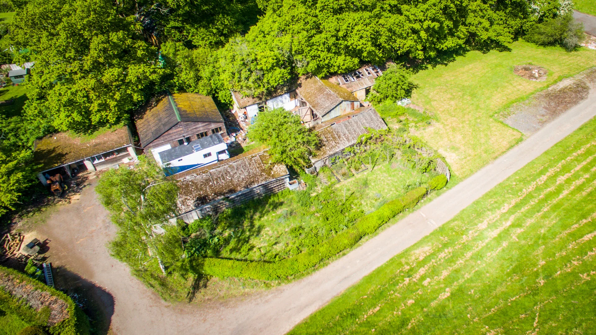 Aerial view from the adjacent field at the entrance, facing Northwest.