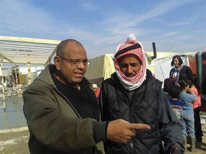 Dr. Hany working with Syrian refugees