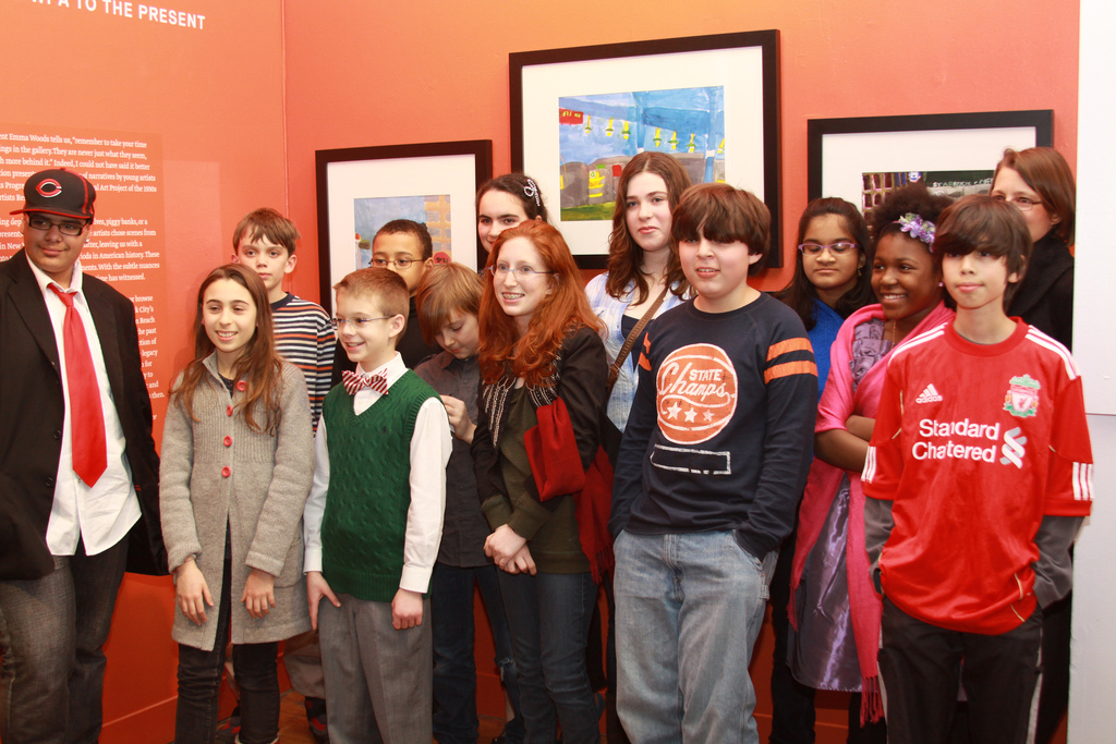 Participants of the Young Artist Residency Program gather to see their artworks at the Opening Reception.