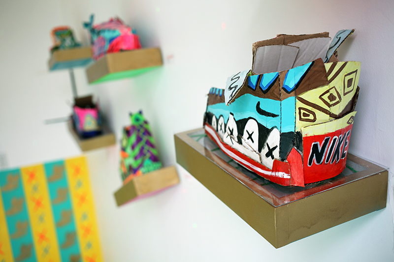 Called "The Trank Locker", the show transformed a white box space into the artist's own interpretation of a fly sneaker shop.