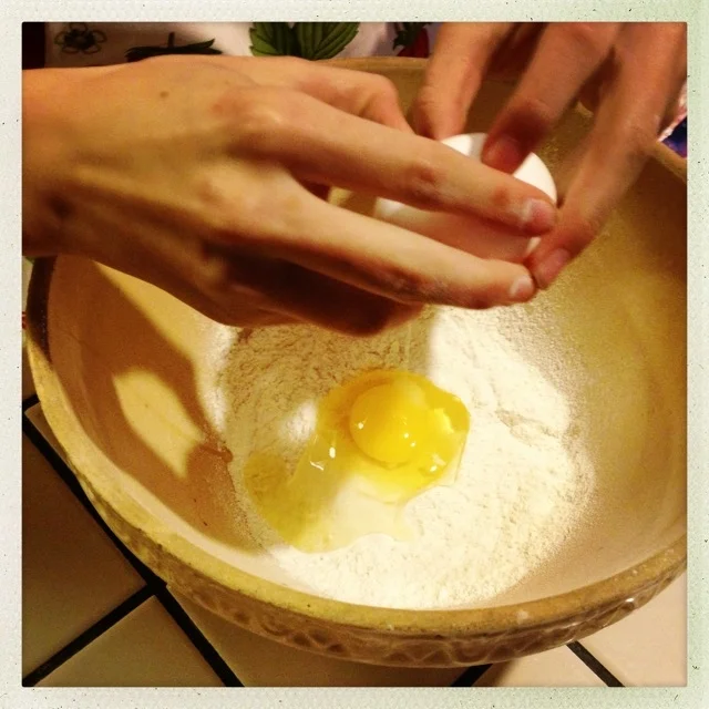 Her hands, empowered and strong, gentle and swift in cracking the eggs.&nbsp;