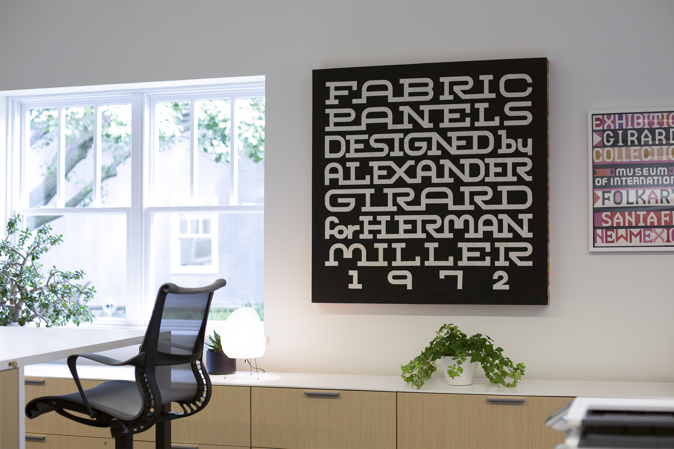 A peek at the Living Office at Herman Miller's Design Yard. Fabric panels and designs by Alexander Girard are sprinkled throughout the space. Photograph by Martha Morimoto.