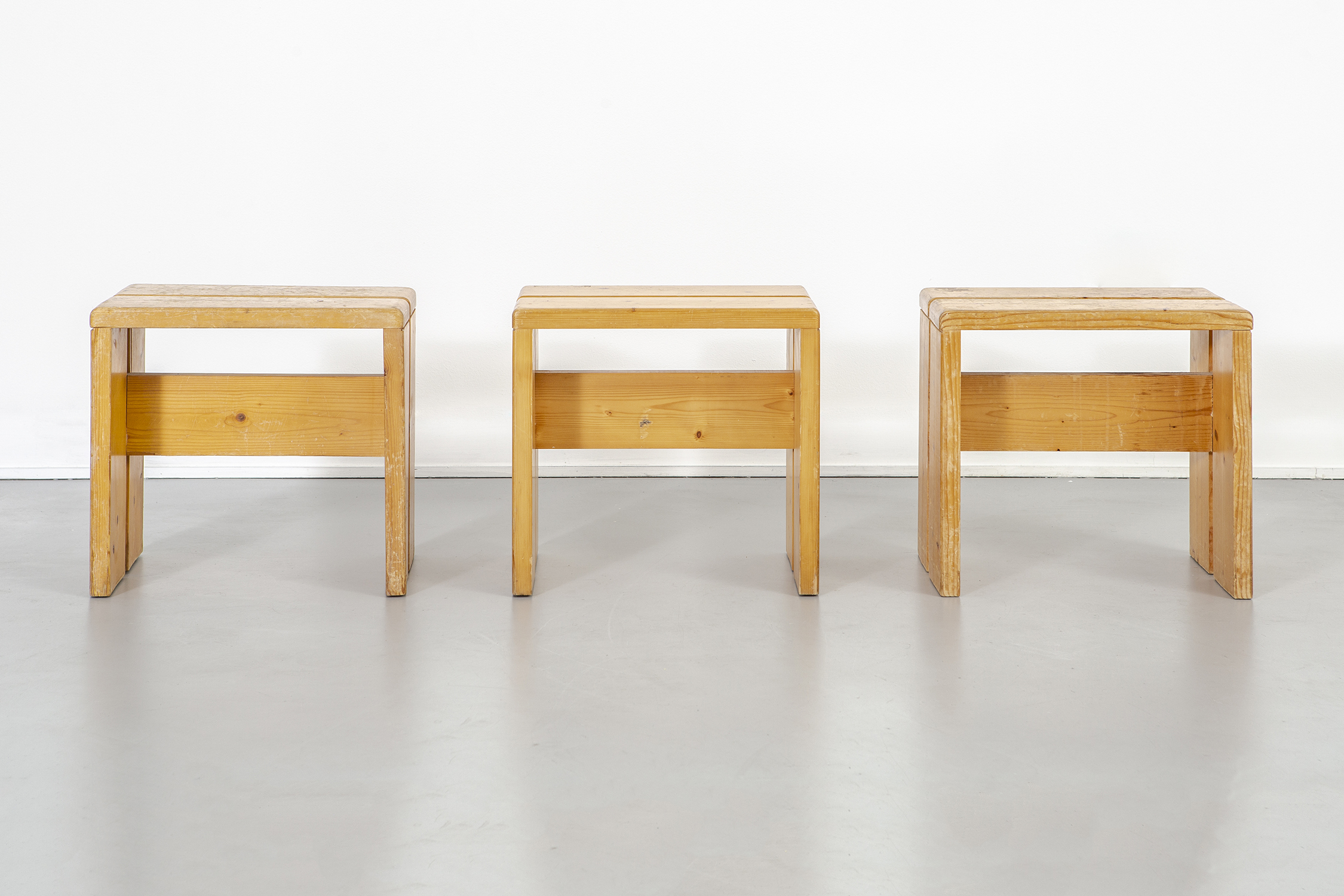 LES ARCS STOOLS BY CHARLOTTE PERRIAND — MATTHEW RACHMAN GALLERY