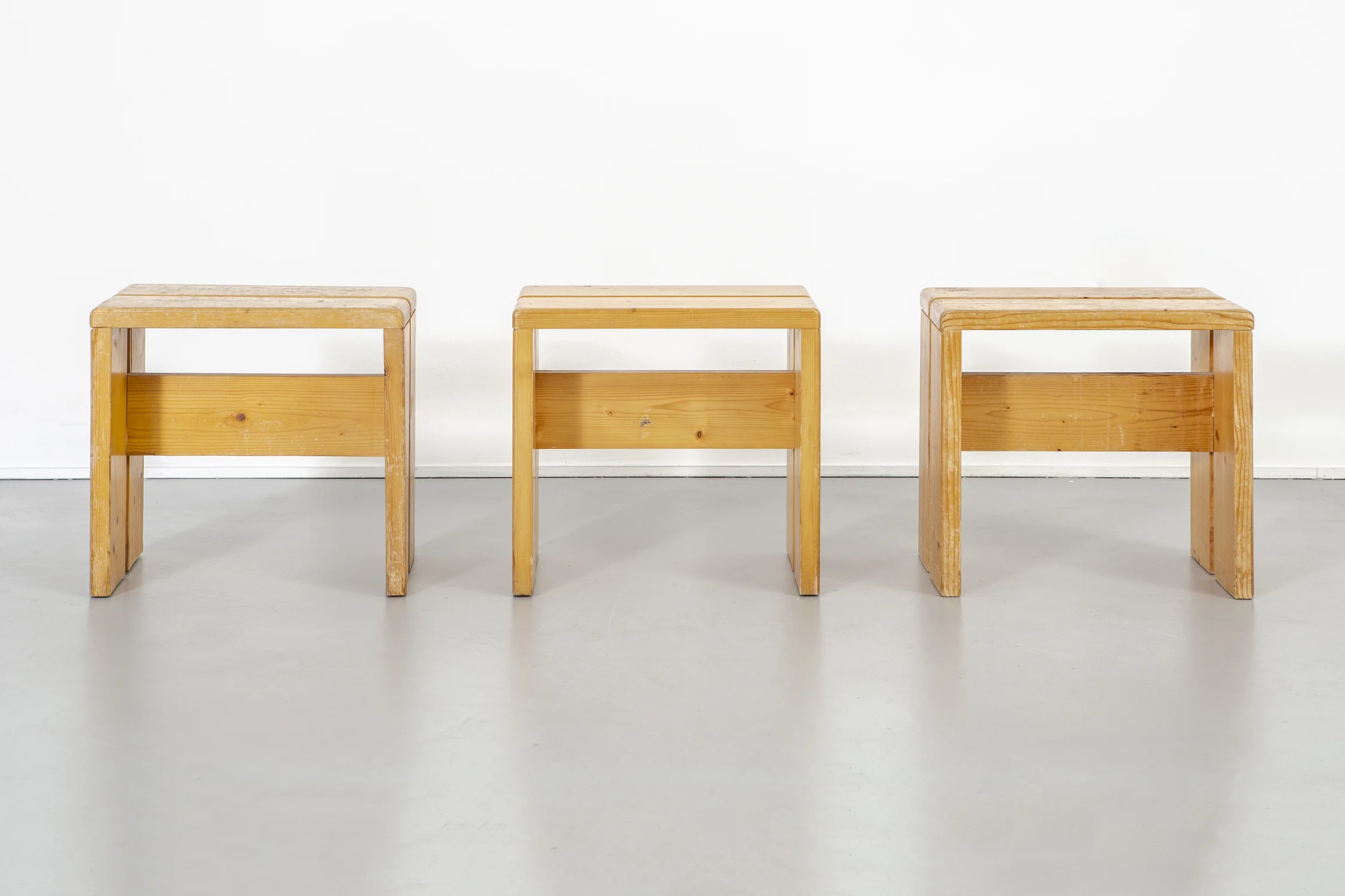 LES ARCS STOOLS BY CHARLOTTE PERRIAND