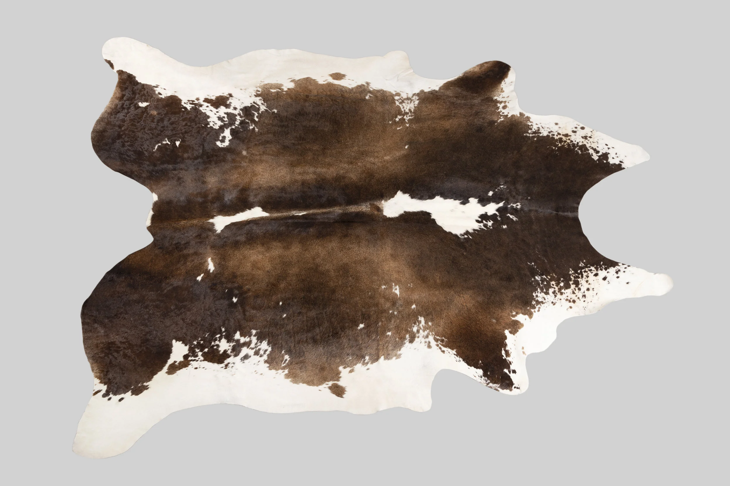 SPOTTED GENUINE BRAZILIAN COWHIDE