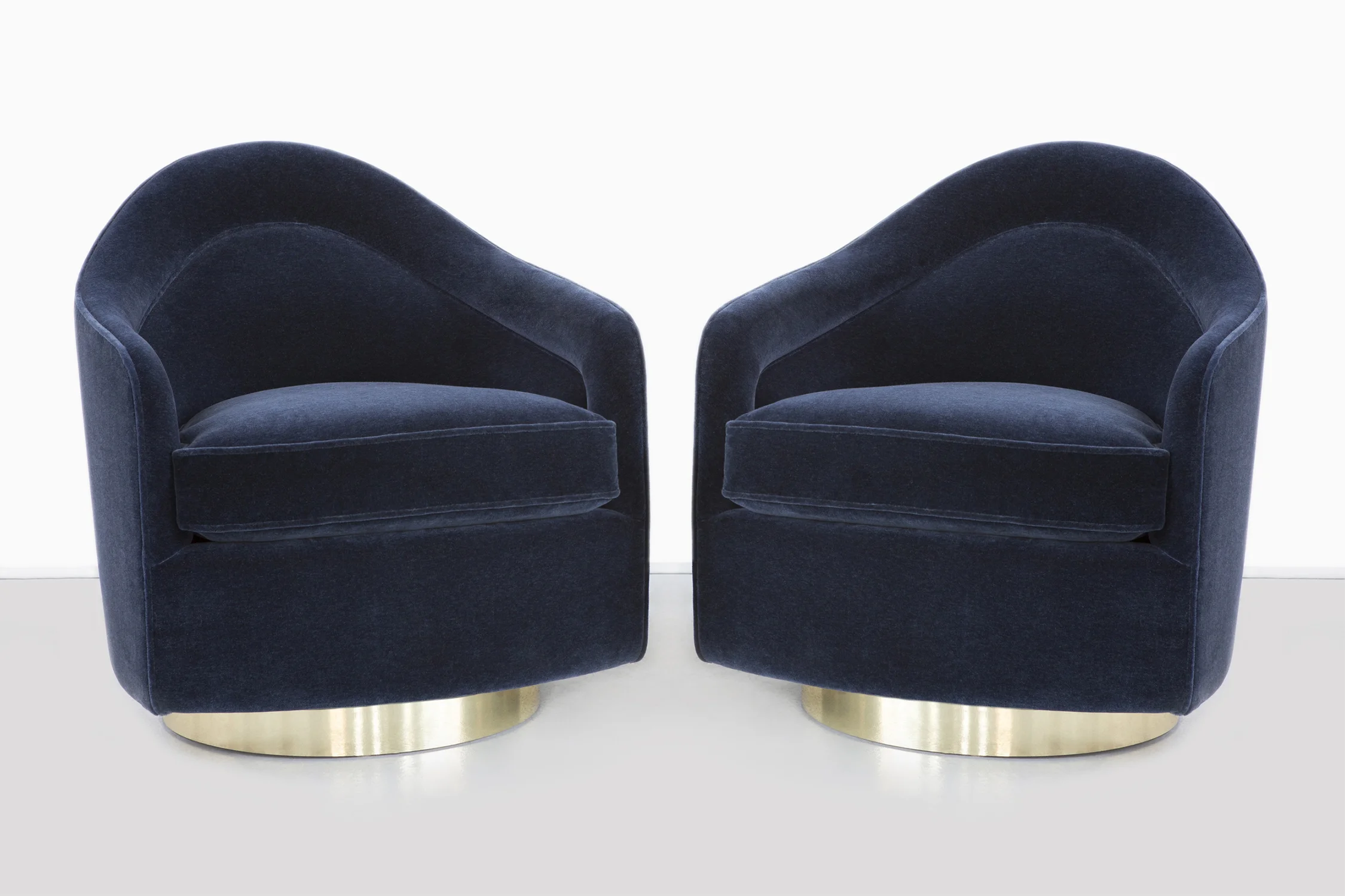 MILO BAUGHMAN SWIVEL CHAIRS