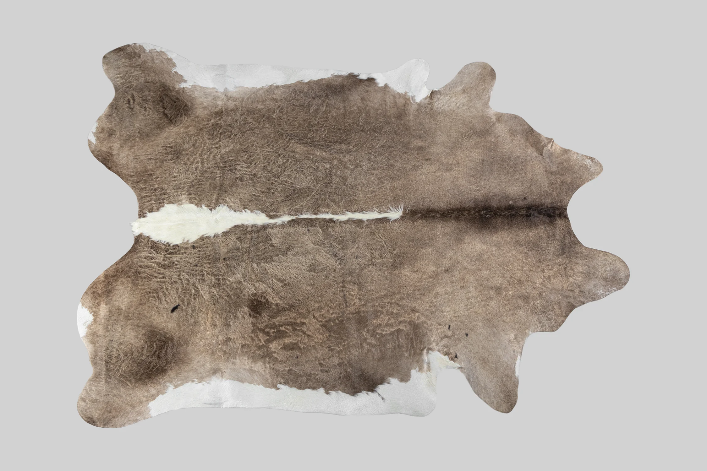 SPOTTED GENUINE BRAZILIAN COWHIDE