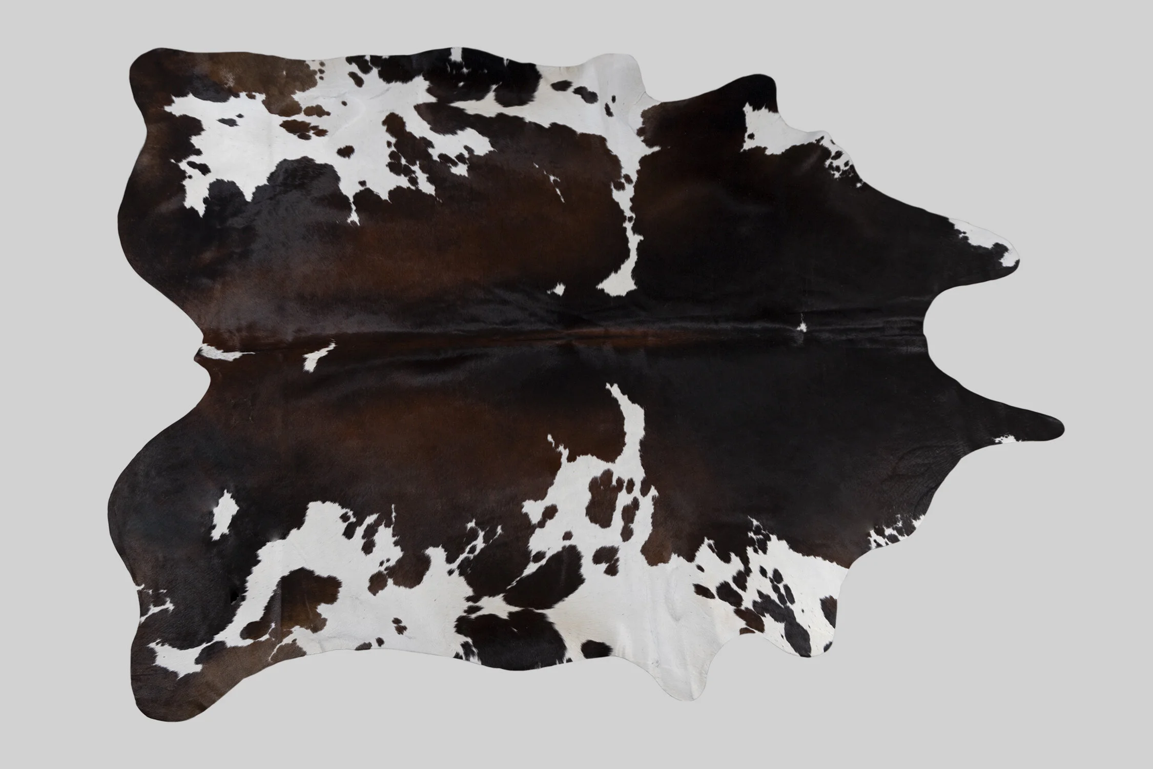 SPOTTED GENUINE BRAZILIAN COWHIDE
