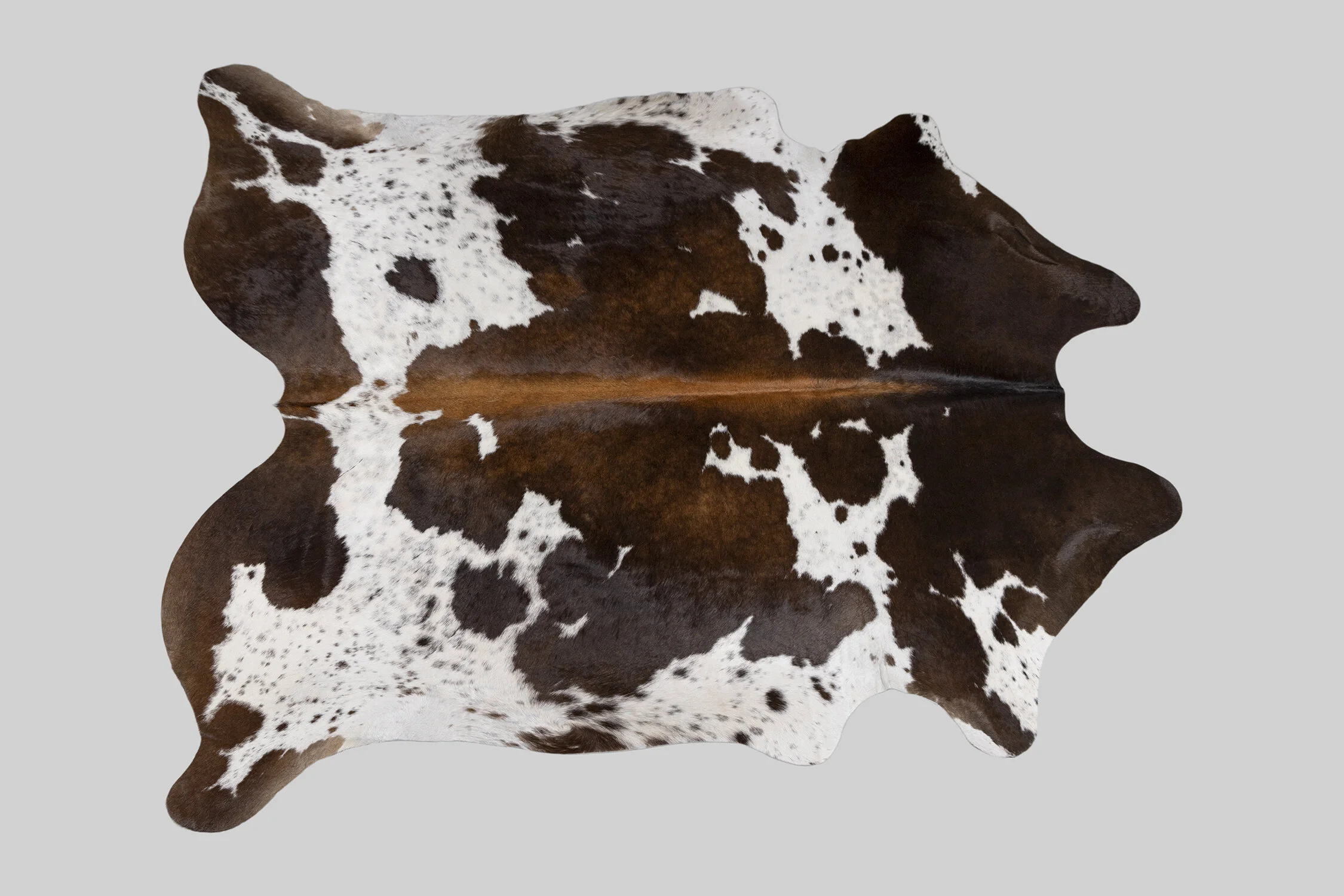 SPOTTED GENUINE BRAZILIAN COWHIDE