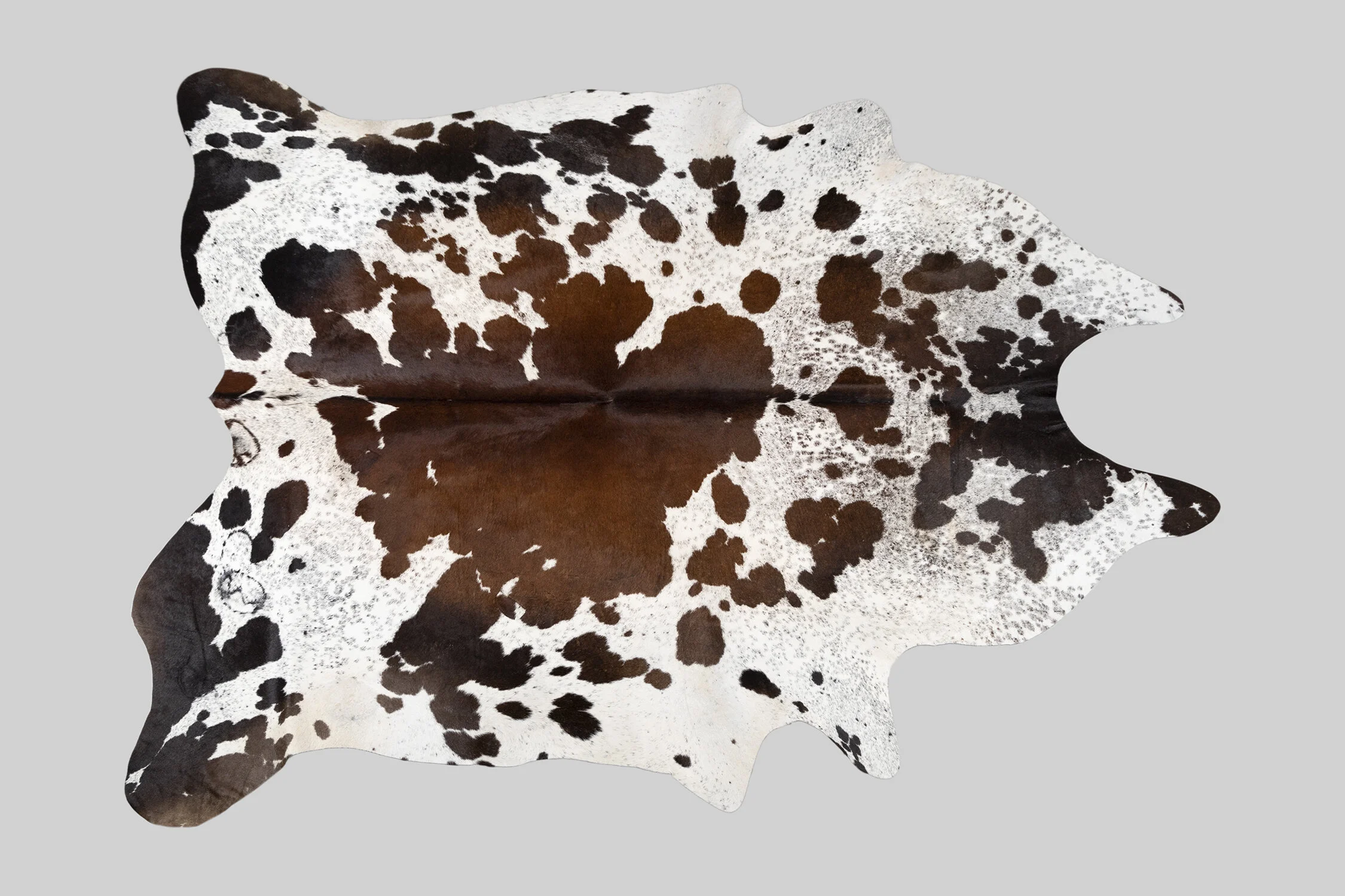 SPOTTED GENUINE BRAZILIAN COWHIDE