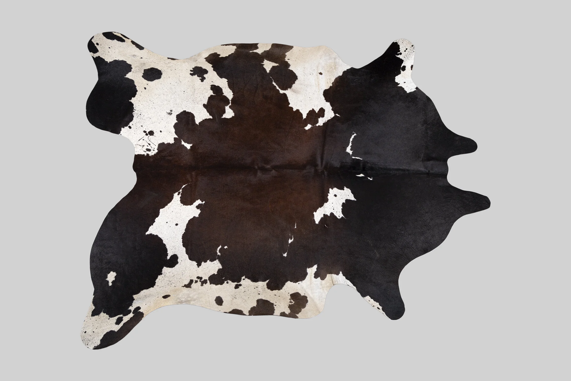 SPOTTED GENUINE BRAZILIAN COWHIDE