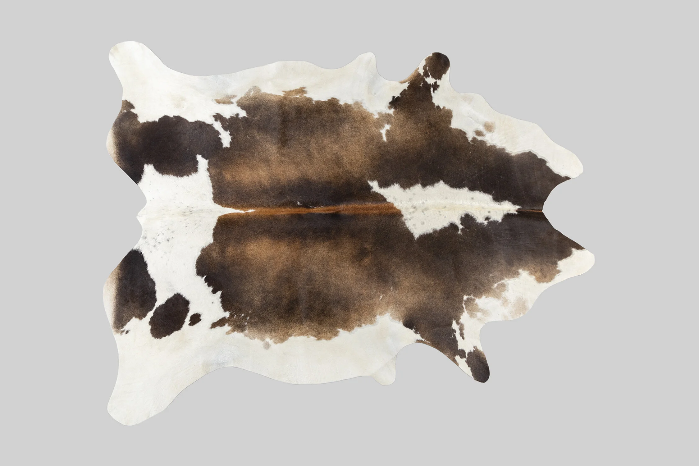 SPOTTED GENUINE BRAZILIAN COWHIDE