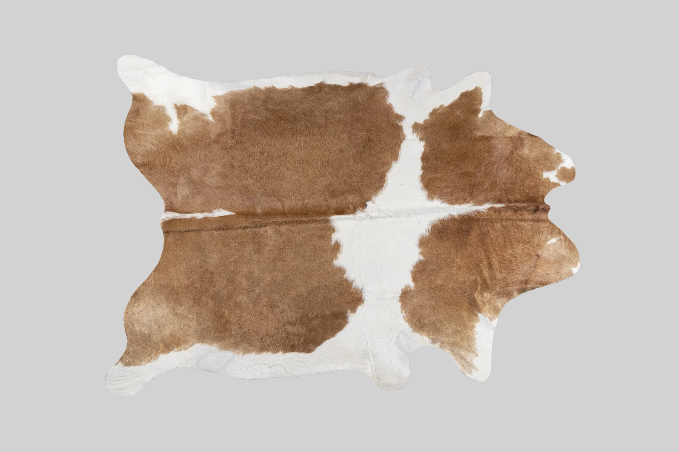 SPOTTED GENUINE BRAZILIAN COWHIDE