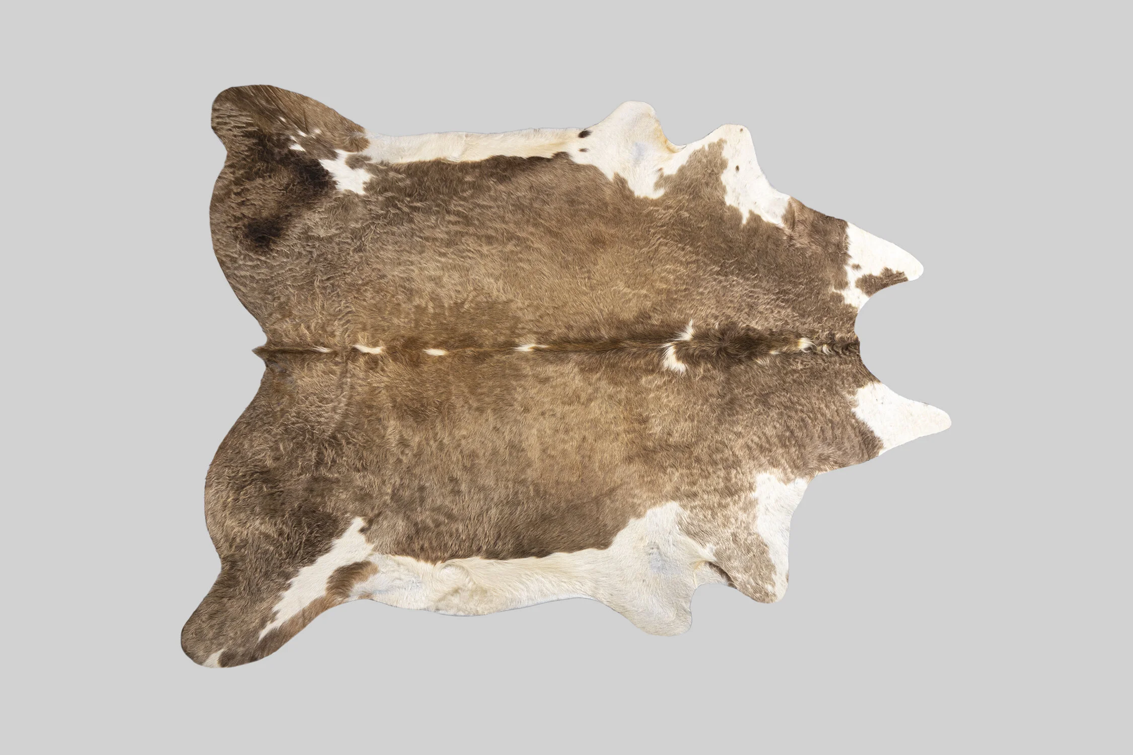 SPOTTED GENUINE BRAZILIAN COWHIDE
