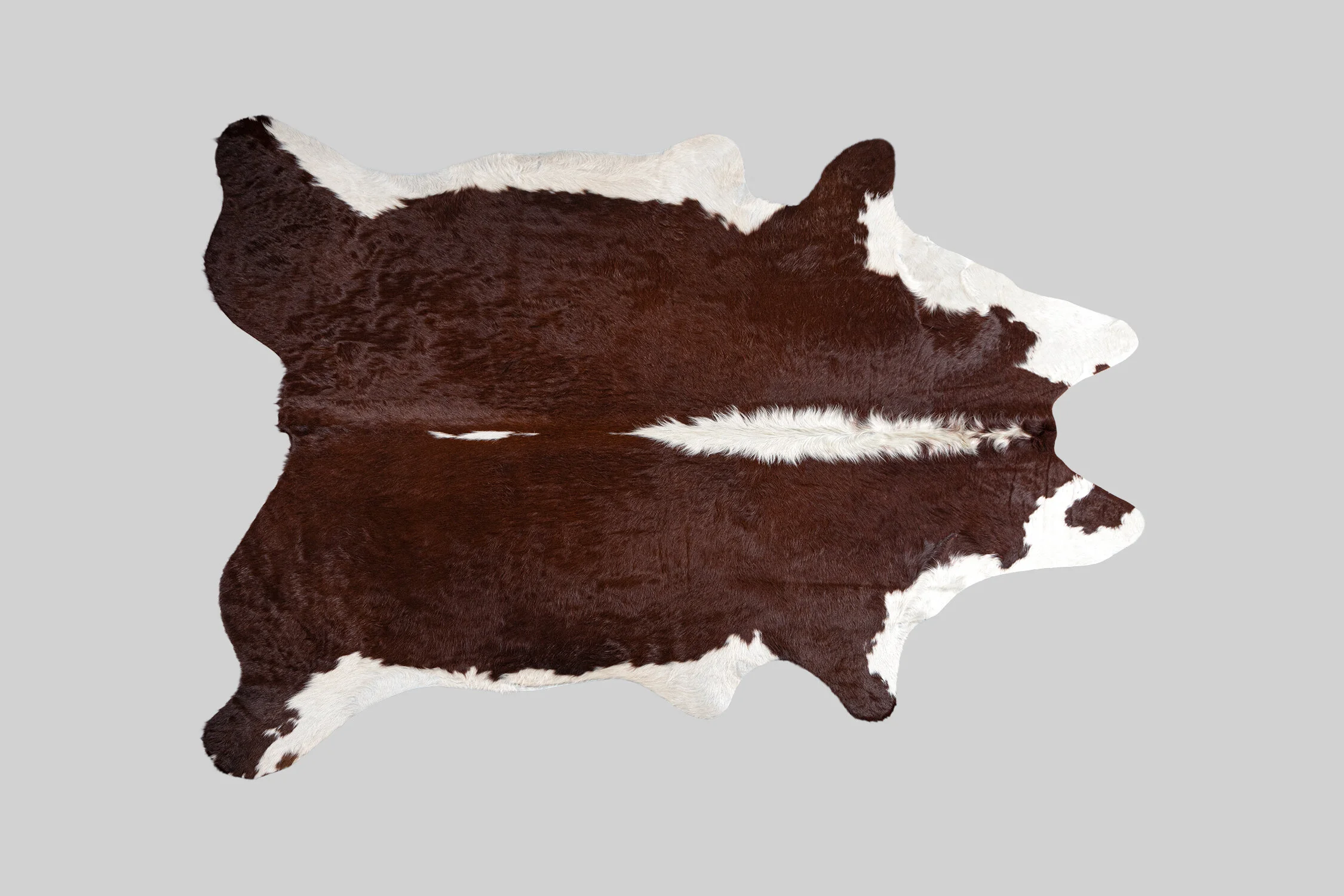SPOTTED GENUINE BRAZILIAN COWHIDE