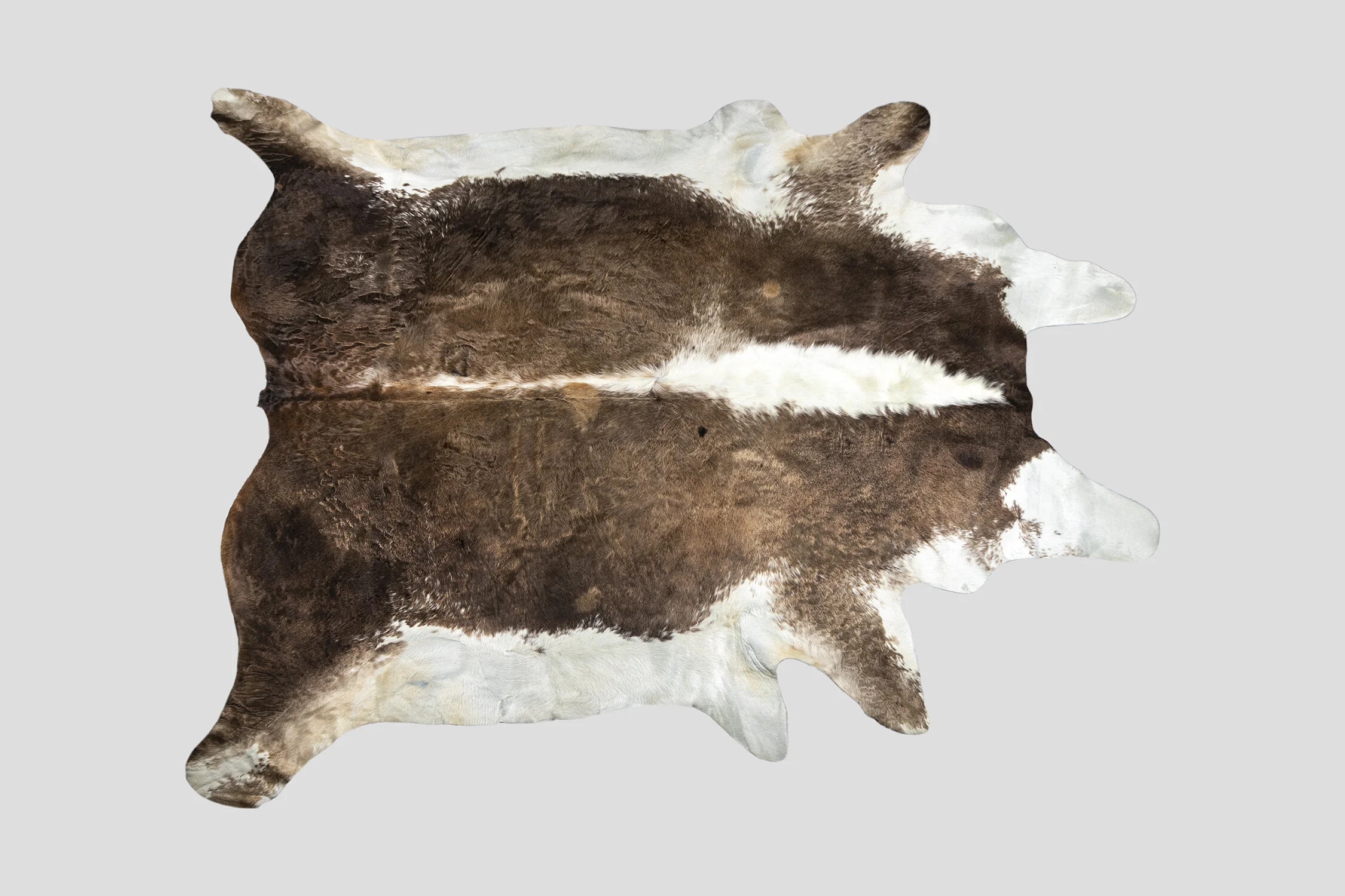 SPOTTED GENUINE BRAZILIAN COWHIDE