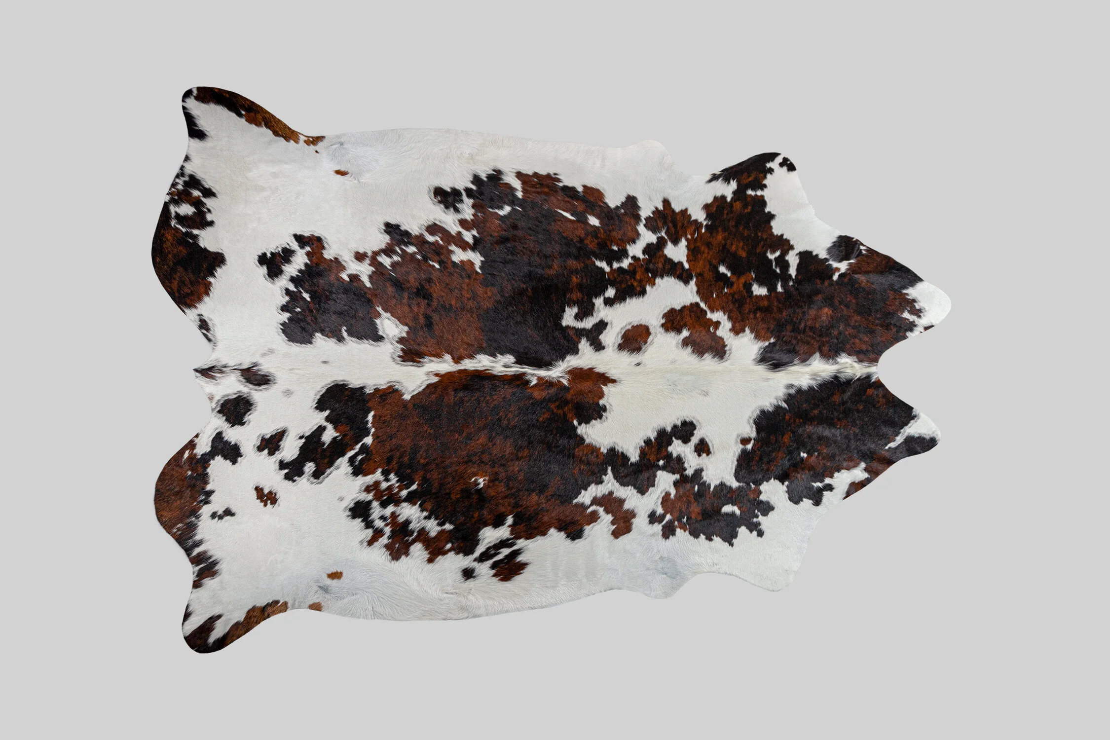 SPOTTED GENUINE BRAZILIAN COWHIDE