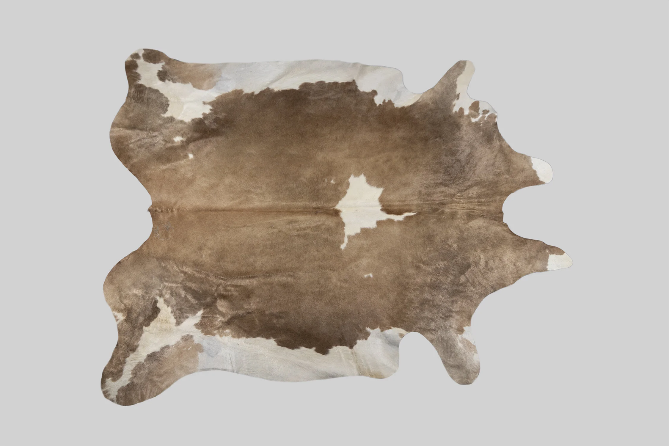 SPOTTED GENUINE BRAZILIAN COWHIDE