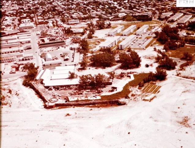 1965 - Fill used from dredging the Harbor to accommodate larger ships to create boundaries that are seen today. Photo from shortly after fill completed, moat is not present. 