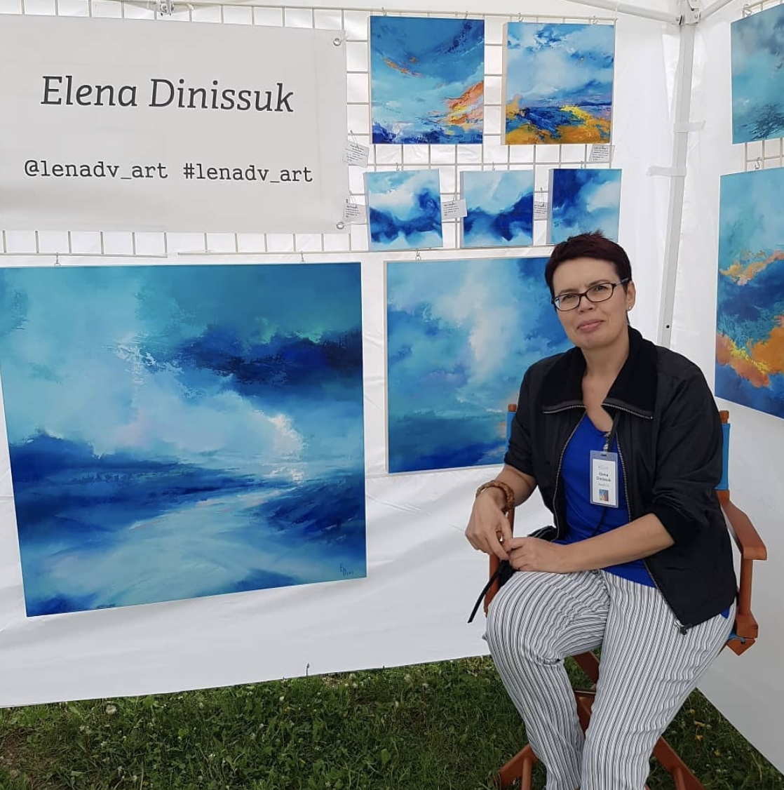 Elena with her work. You can follow her @lenadv_ art and #lenadv_ art