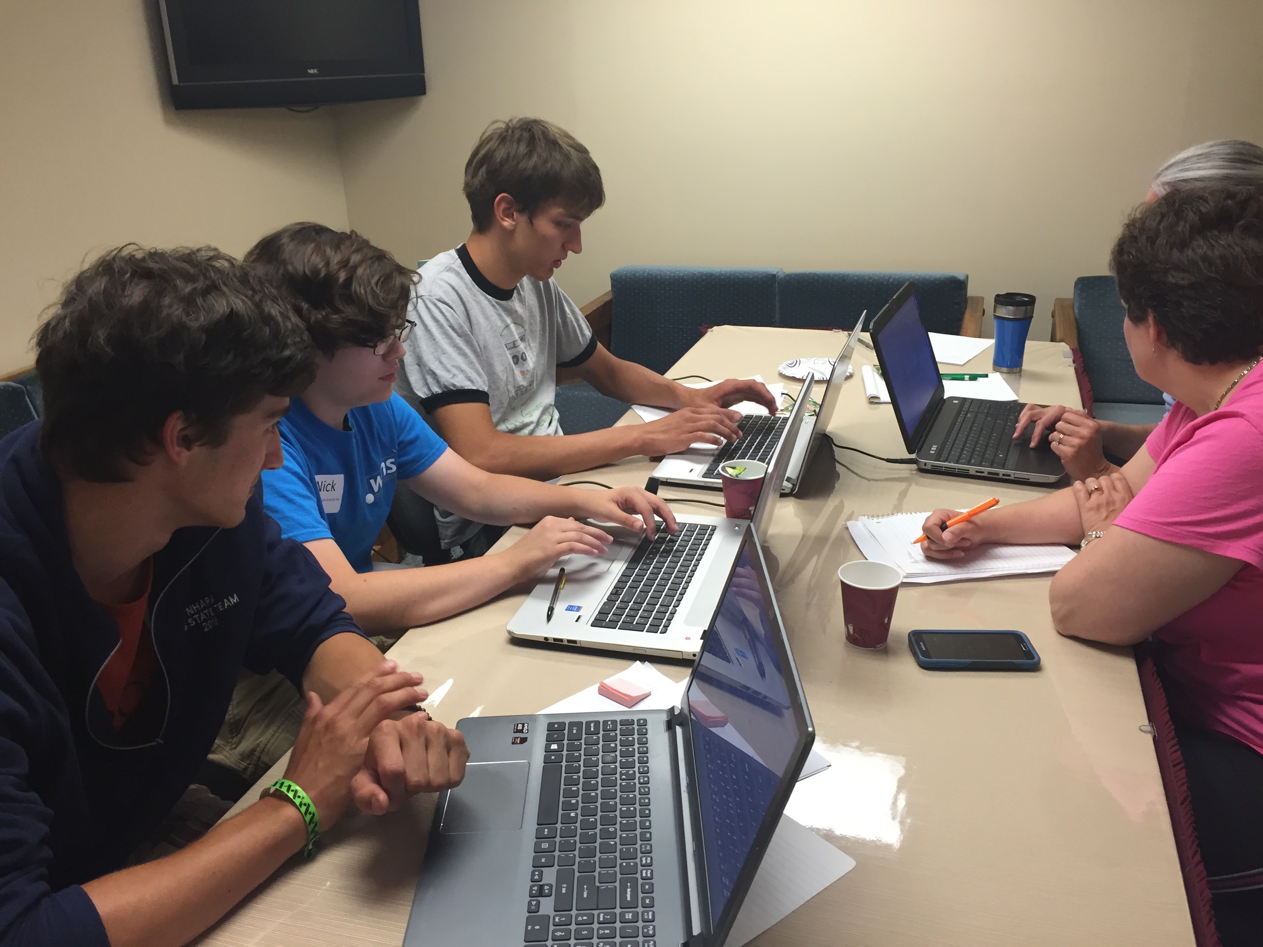  Teams were organized into specialty areas. This group worked on calculations for launch locations, rise and decent rates and other mathematical aspects. 