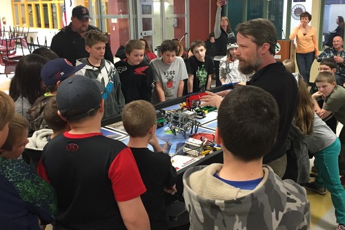 Following the challenge tasks, Bill Church of White Mountain Science Inc. demonstrated a couple sophisticated LEGO robots. One was a prototype built by a student during a week-long summer camp that utilized a variety of sensors to simulate a sensing-cane to aide a visually impaired person. The other was a robot based on the Strand Beest . Bill also spoke to the students about their potential for professional careers in the STEM fields. More pictures .