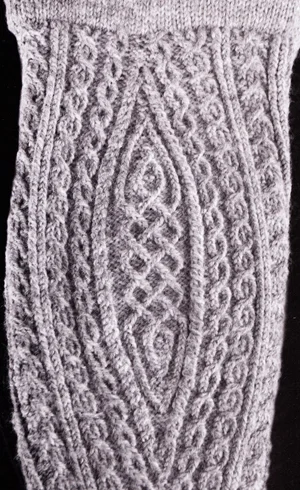 I love the patterning in the calf gusset of this traditional twisted-stich stocking.