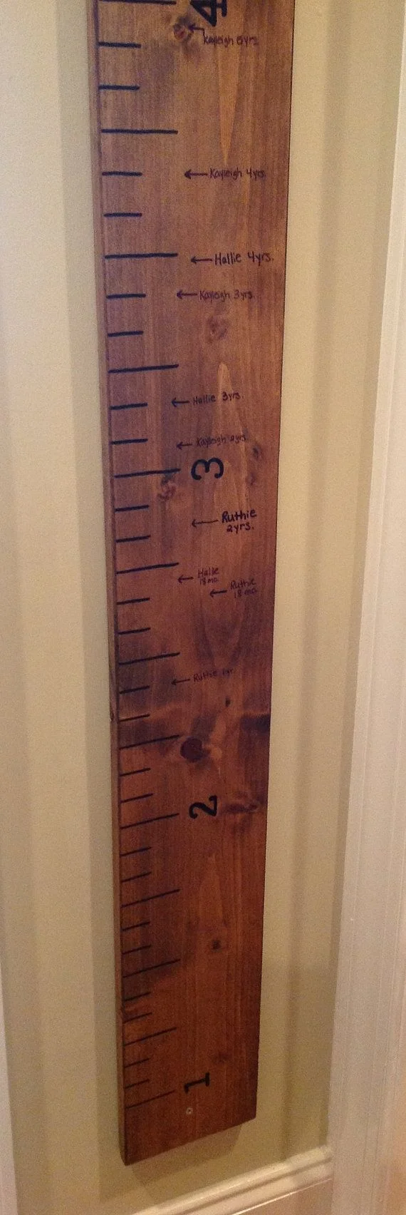 Wall-hung ruler makes measuring height a movable cinch.