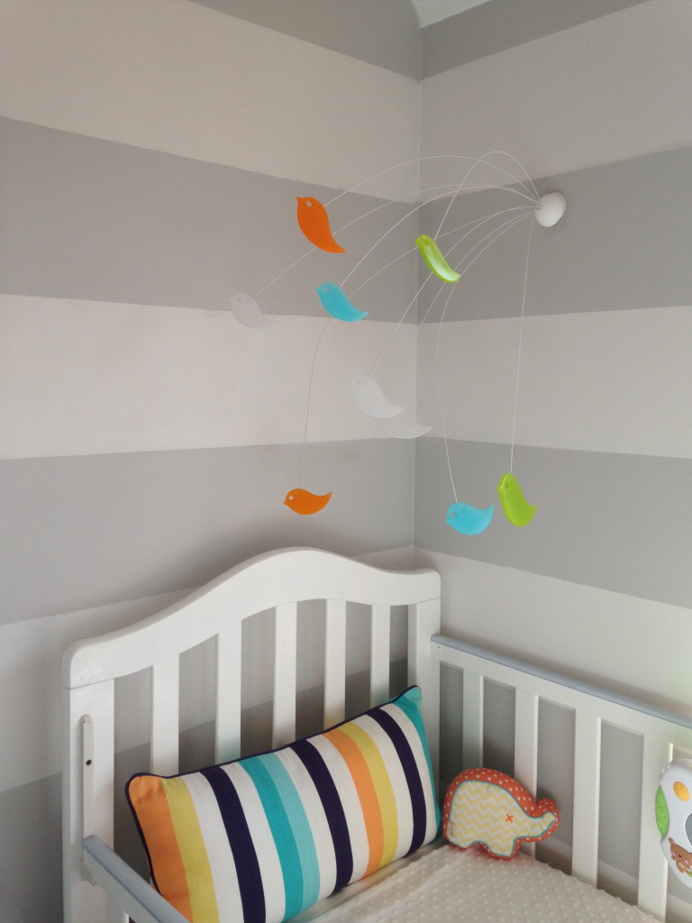 Wall-mounted crib mobile: out of reach