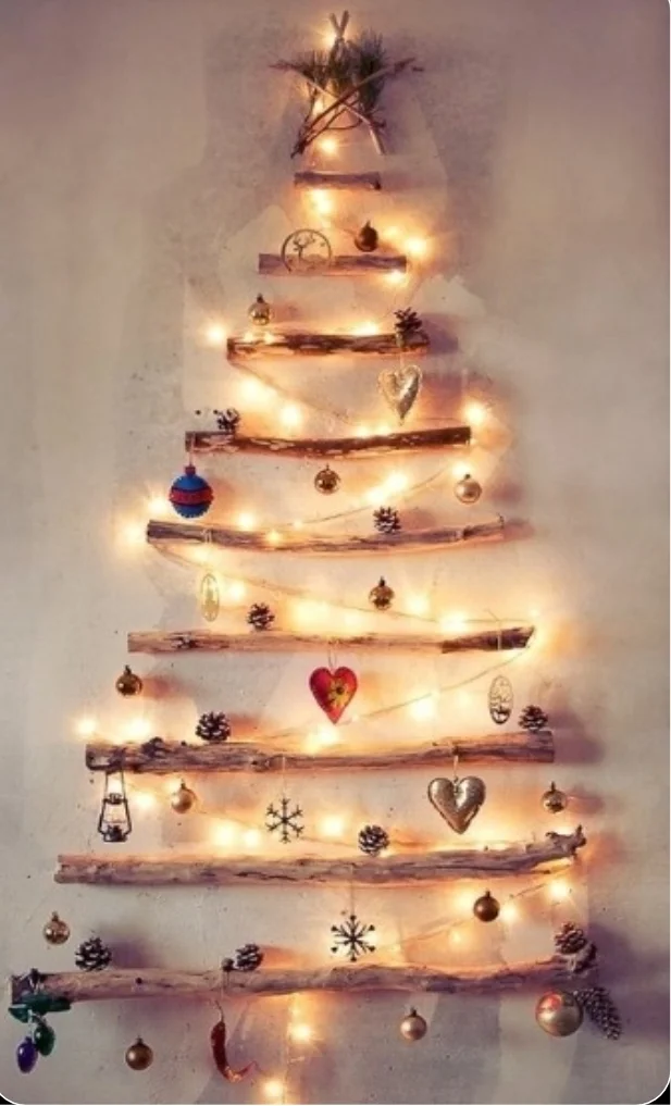 Repurpose wood to make a wall hanging Christmas tree!