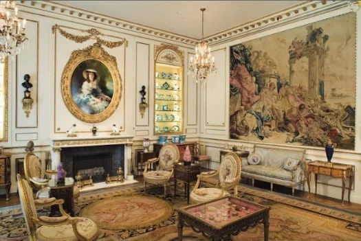 French-inspired interior design: a first glance at home decor utilizing art, tapestry, and shelves