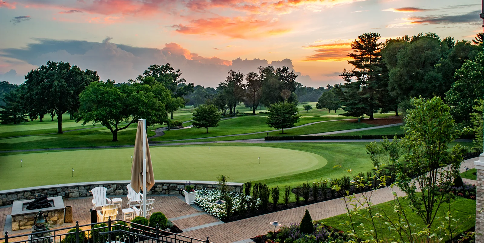 The main clubhouse looks over a large practice putting green. 