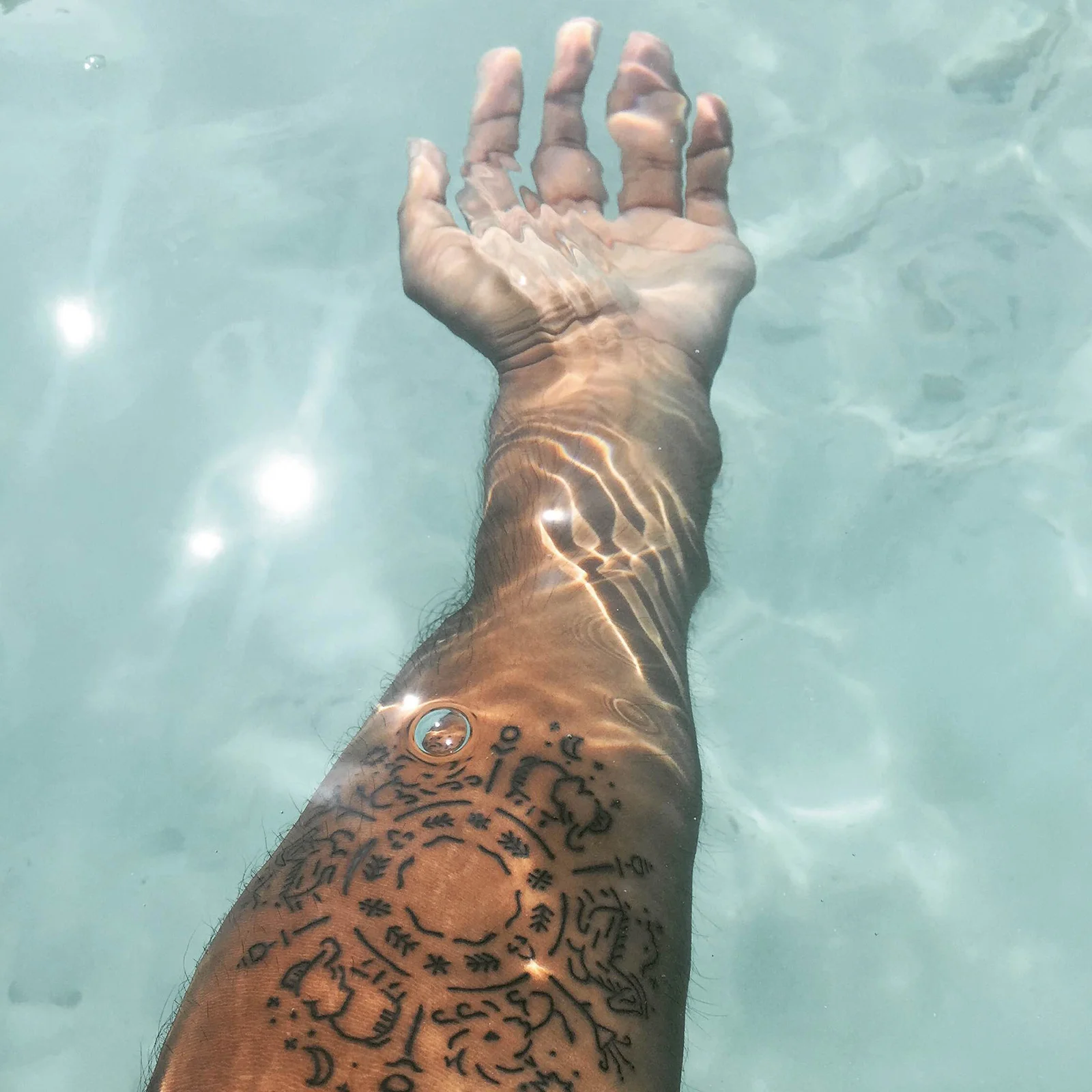 trzown-minimal-buddhist-tattoo-tish-photo2.jpg