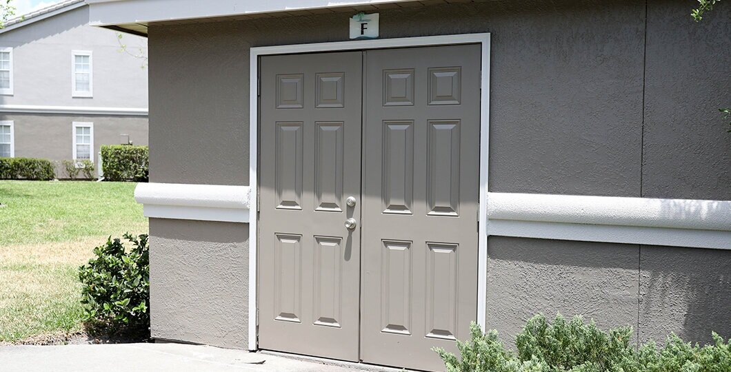 dark grey building and door