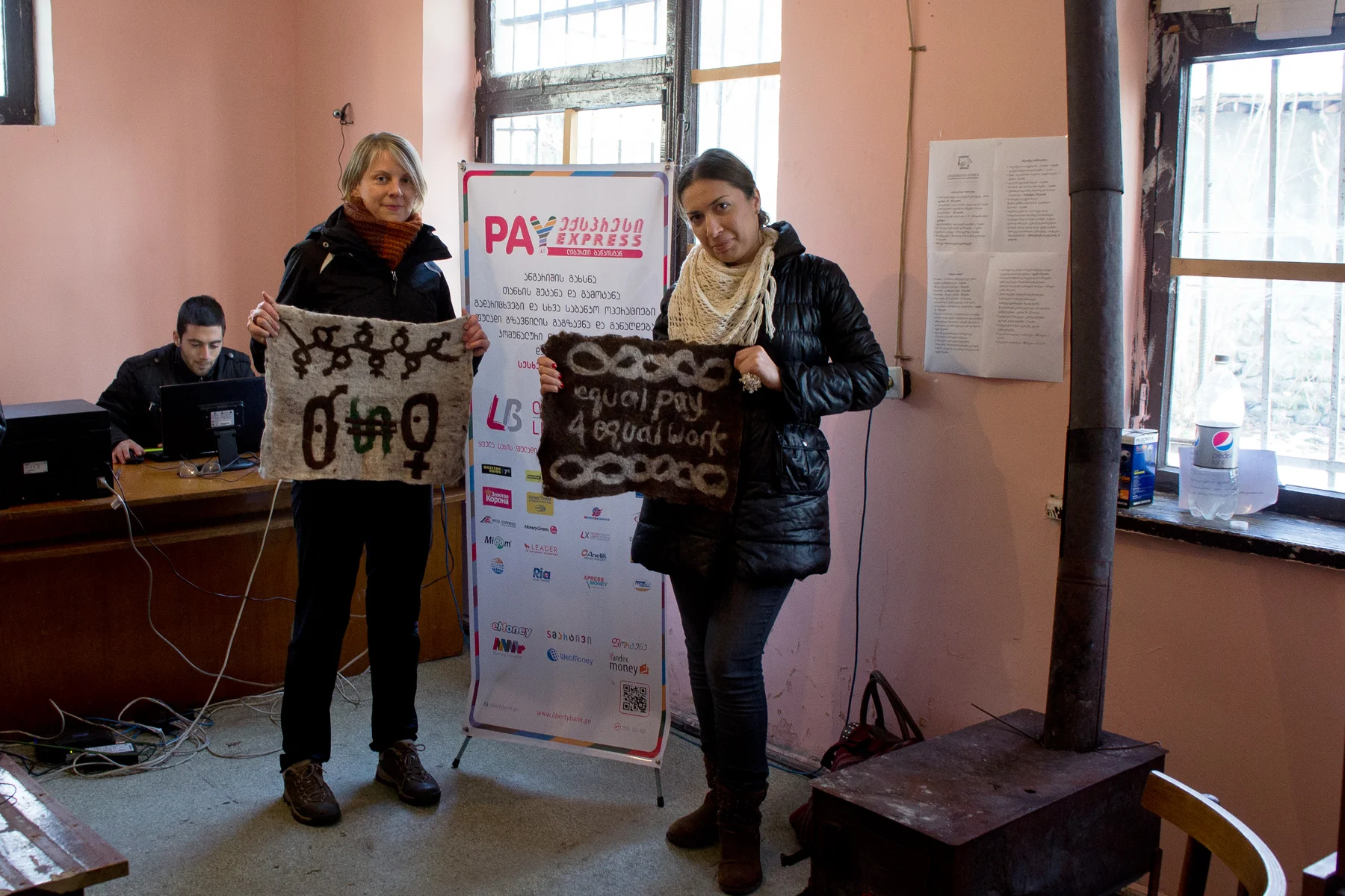 Melissa Potter and Ida Bakhturidze in a Georgian village credit union.