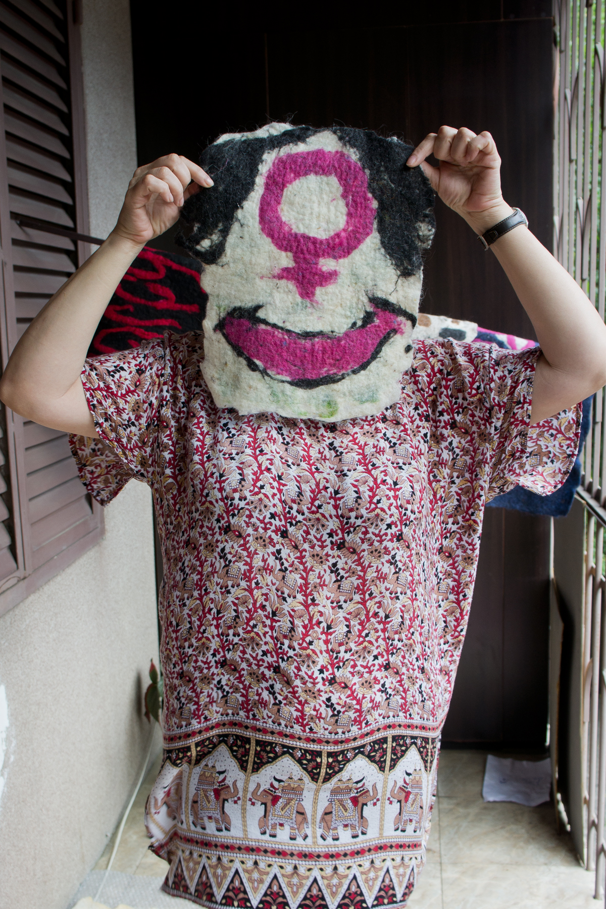   Women's Fund in Georgia founder, Nana Pantsulaia and her feminist mask.  