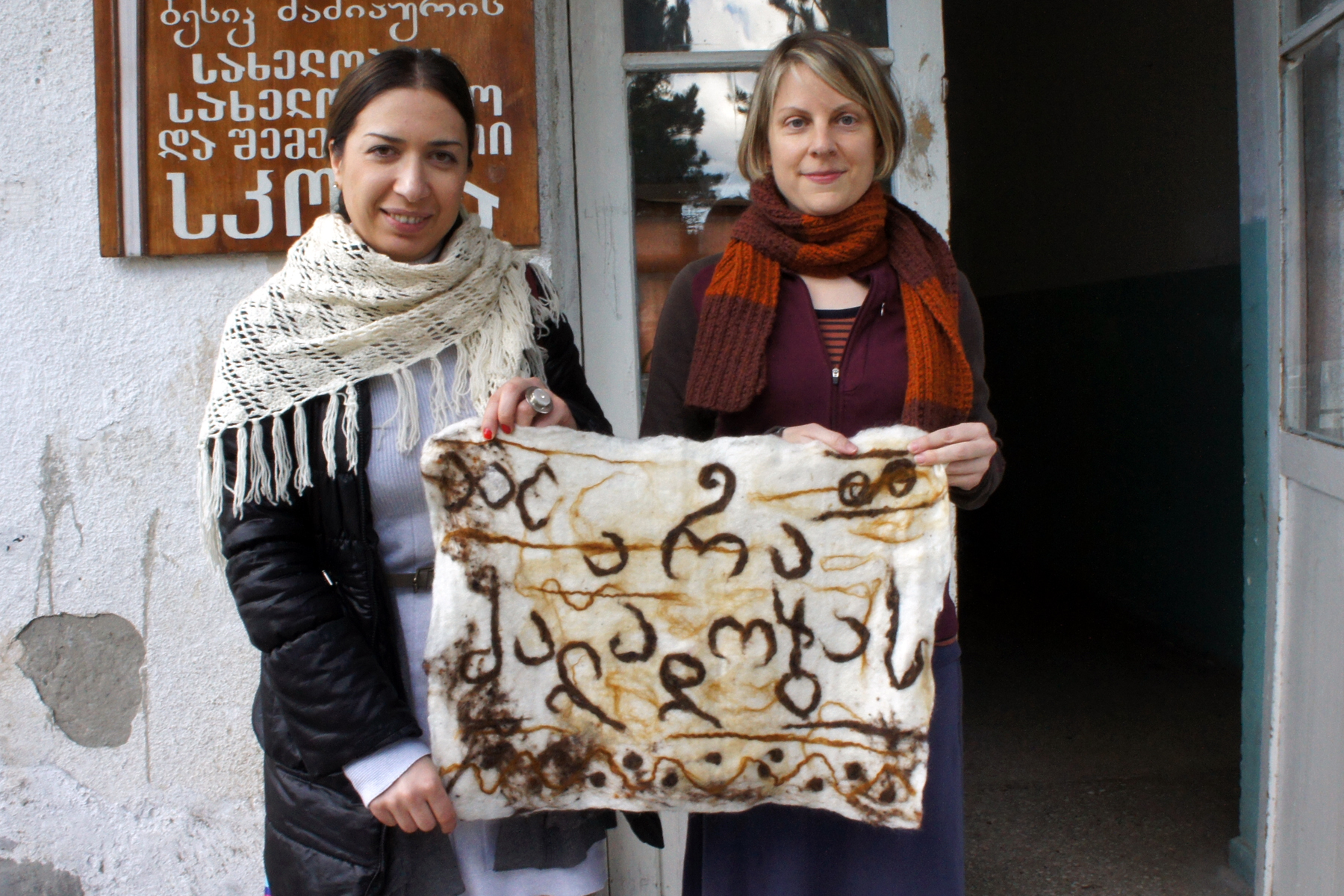   Ida Bakhturidze and Melissa Potter in front of the Alvani school.  