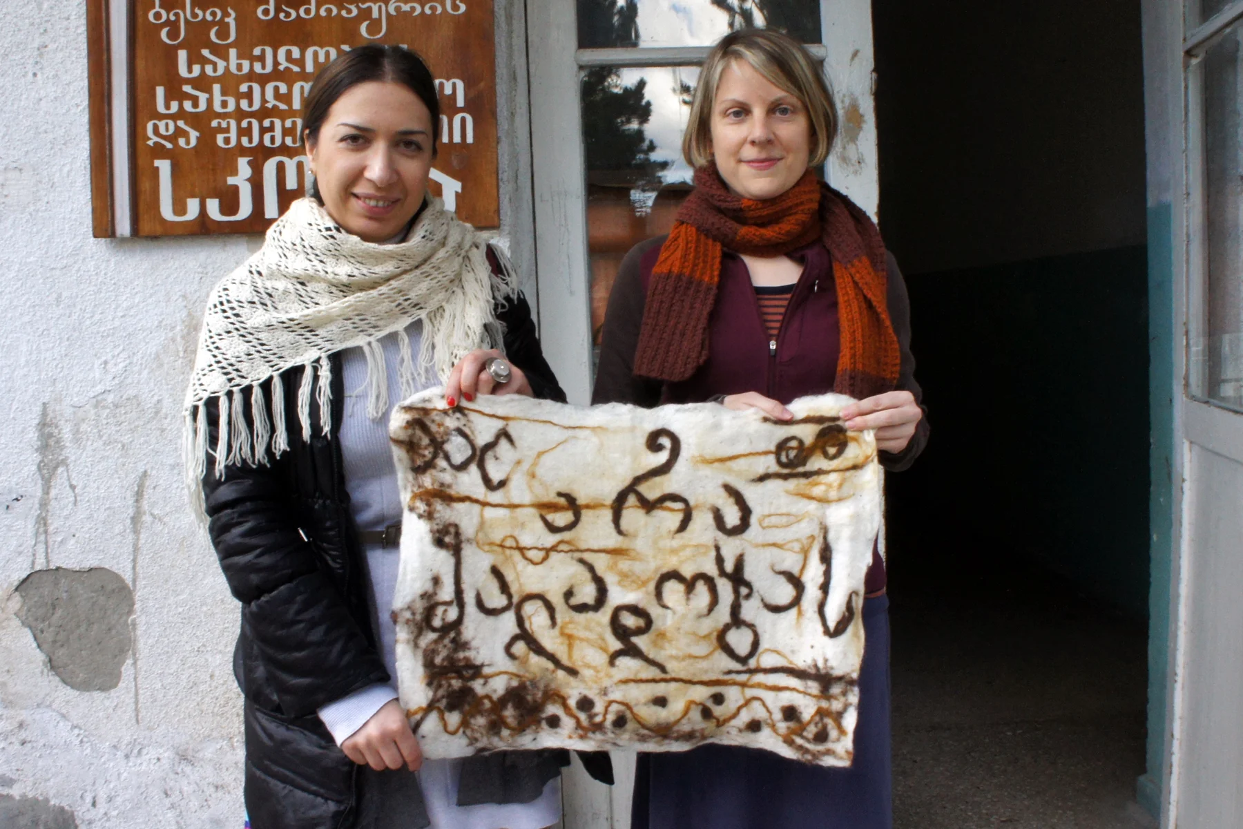 Ida Bakhturidze and Melissa Potter in front of the Alvani school.
