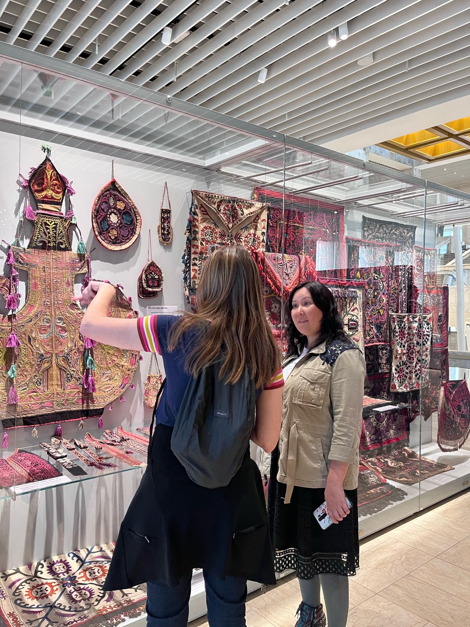   Looking at craft objects made by women on display at the State History Museum, Bishkek, Kyrgyzstan with Altynai Kudaibergenova.  