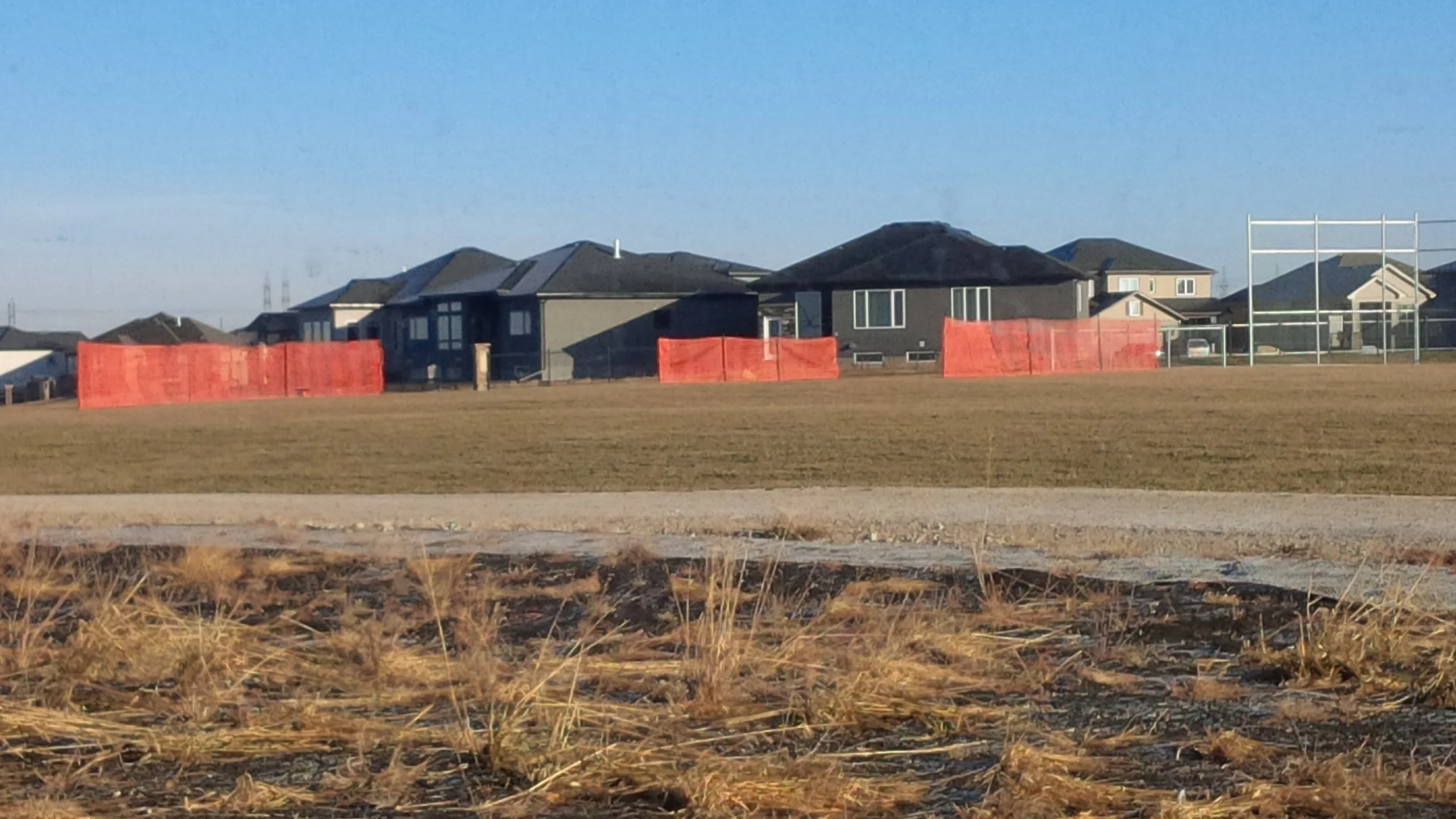 Picture of snow fences that were installed in preparation for this past winter.