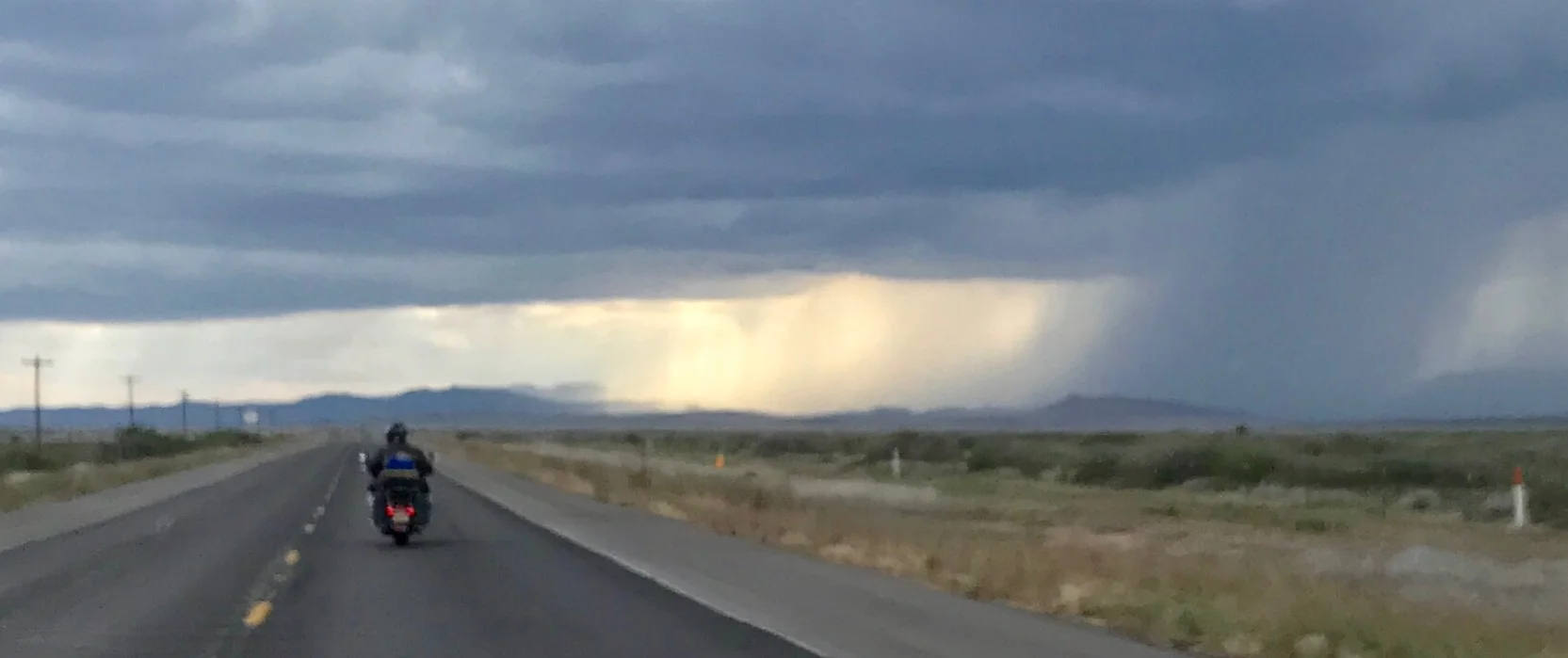 Approaching Marathon, Texas after a 500+ mile day. Great weather! We managed to stay just left of that downpour.