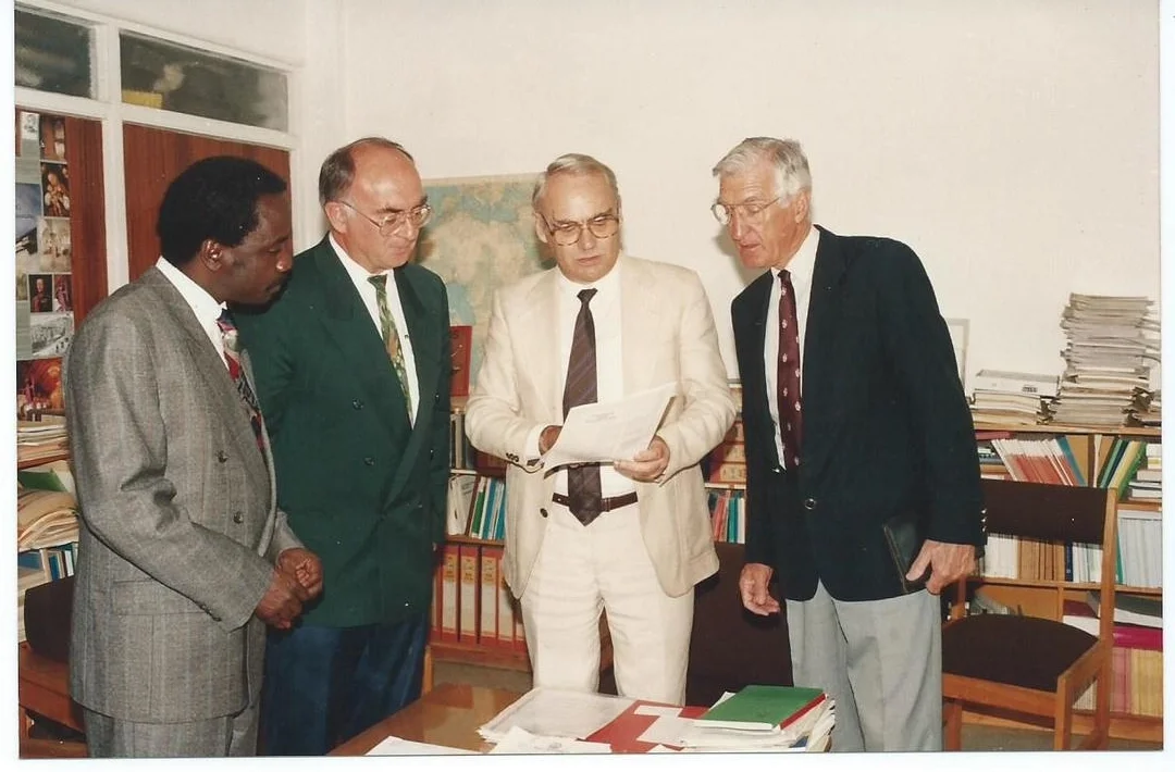 German Academic Exchange Services (DAAD) Regional Representative, Eastern Africa, Nairobi, Donating Funds for the MSc and PhD Program of ABI-GIDE in (1994). From Left: Dr. Alfred Latigo, Chair ABI-GIDE MSc/PhD Academic Panel; Prof. Dr. Paul Muller (Late), Chair Board of Directors, ABI-GIDE; Regional Representative, German Academic Exchange Services (DAAD), Nairobi; Dr. Paul Capstick, Deputy Executive Director, ABI-GIDE (1994)